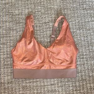 Fabletics Shimmering peach Women's sports bra. Size medium.
